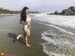 Cuffed on the beach